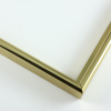 This simple metal picture frame has a smooth, frosted gold finish with a brushed outer drop edge and curved profile.
.375 " width: ideal for small, medium or large artworks. Easily frame photographs, thicker cloth or needlework art, or even Giclée canvas prints.